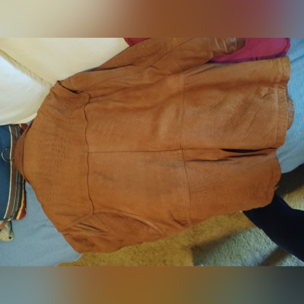 Mid length leather coat with lining